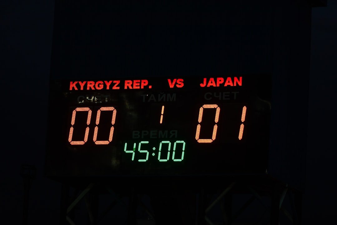 Digital clock showing Tokyo time amid Japan's NFT gaming Ponzi scheme investigation